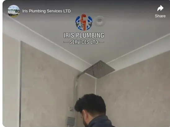 Iris Plumbing Services fitting a rainfall shower during a walk-in shower project